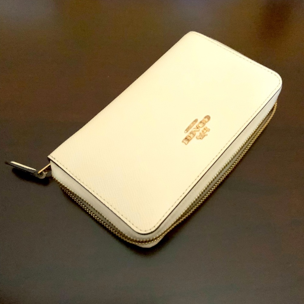 White Coach leather zip wallet